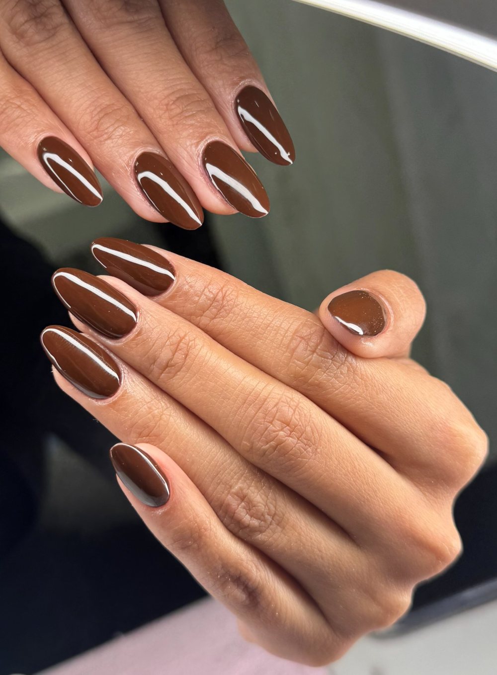 Chocolate chrome gel nails with mirror finish