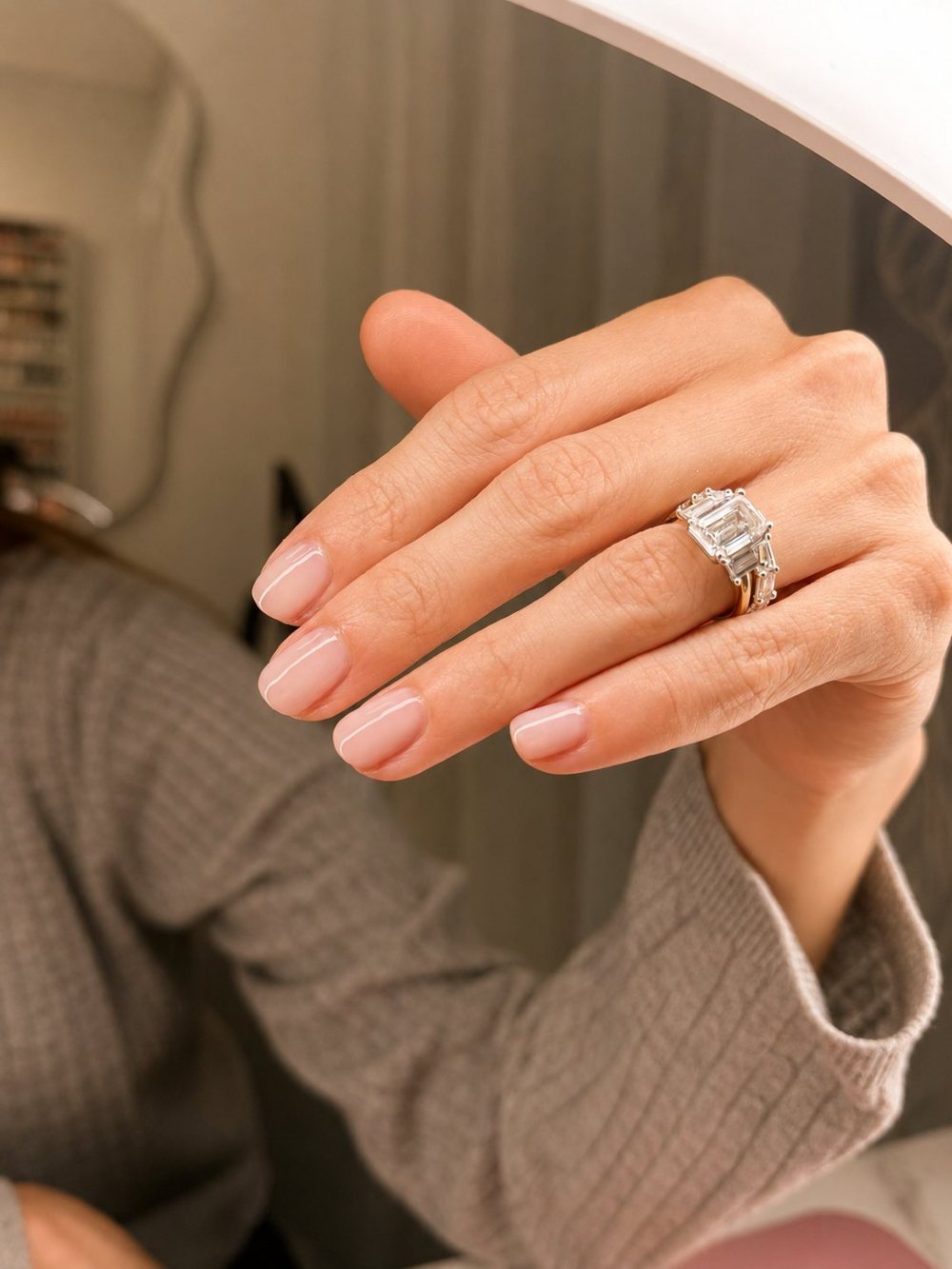 Classic white French gel manicure on almond nails