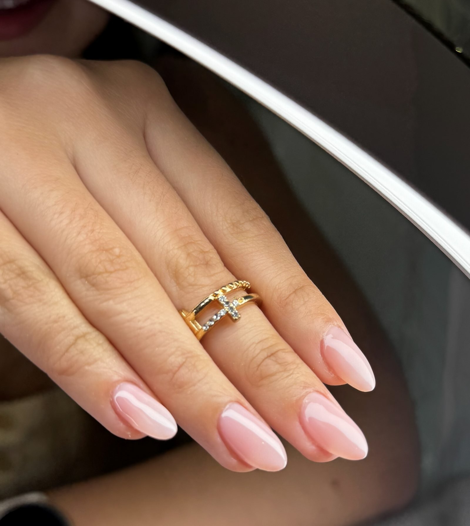 Soft nude almond gel manicure with glossy finish