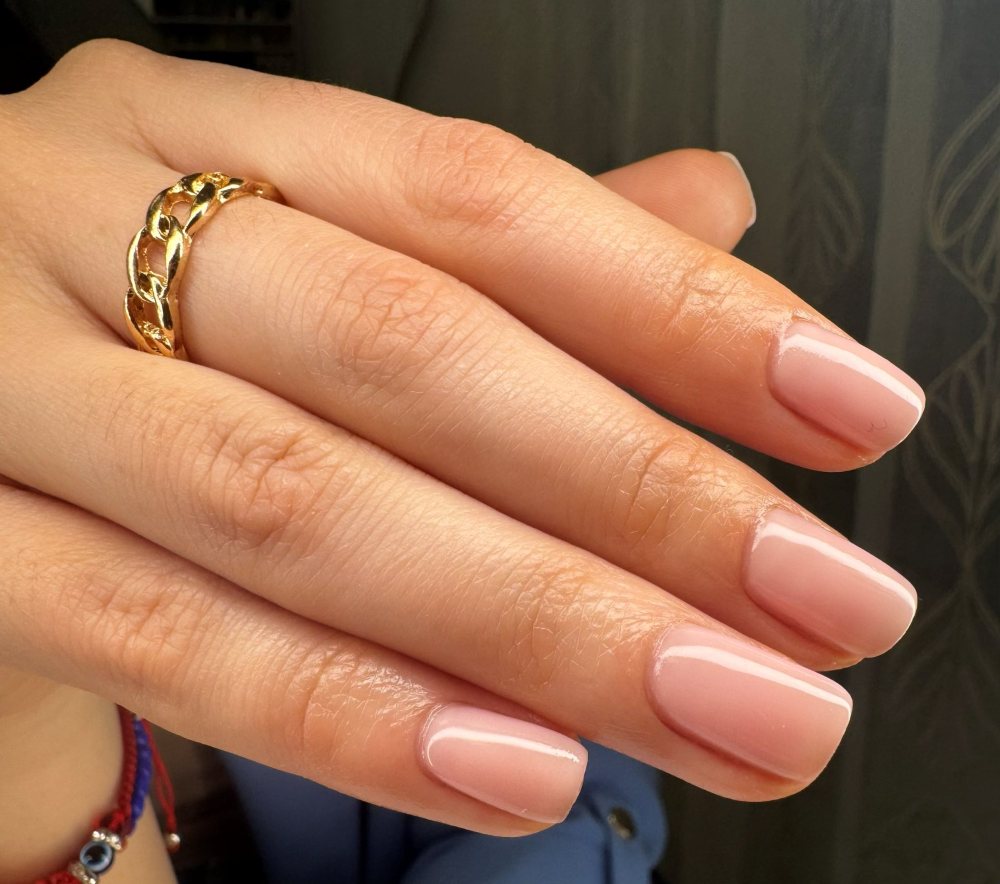 Nude gel manicure with glossy finish